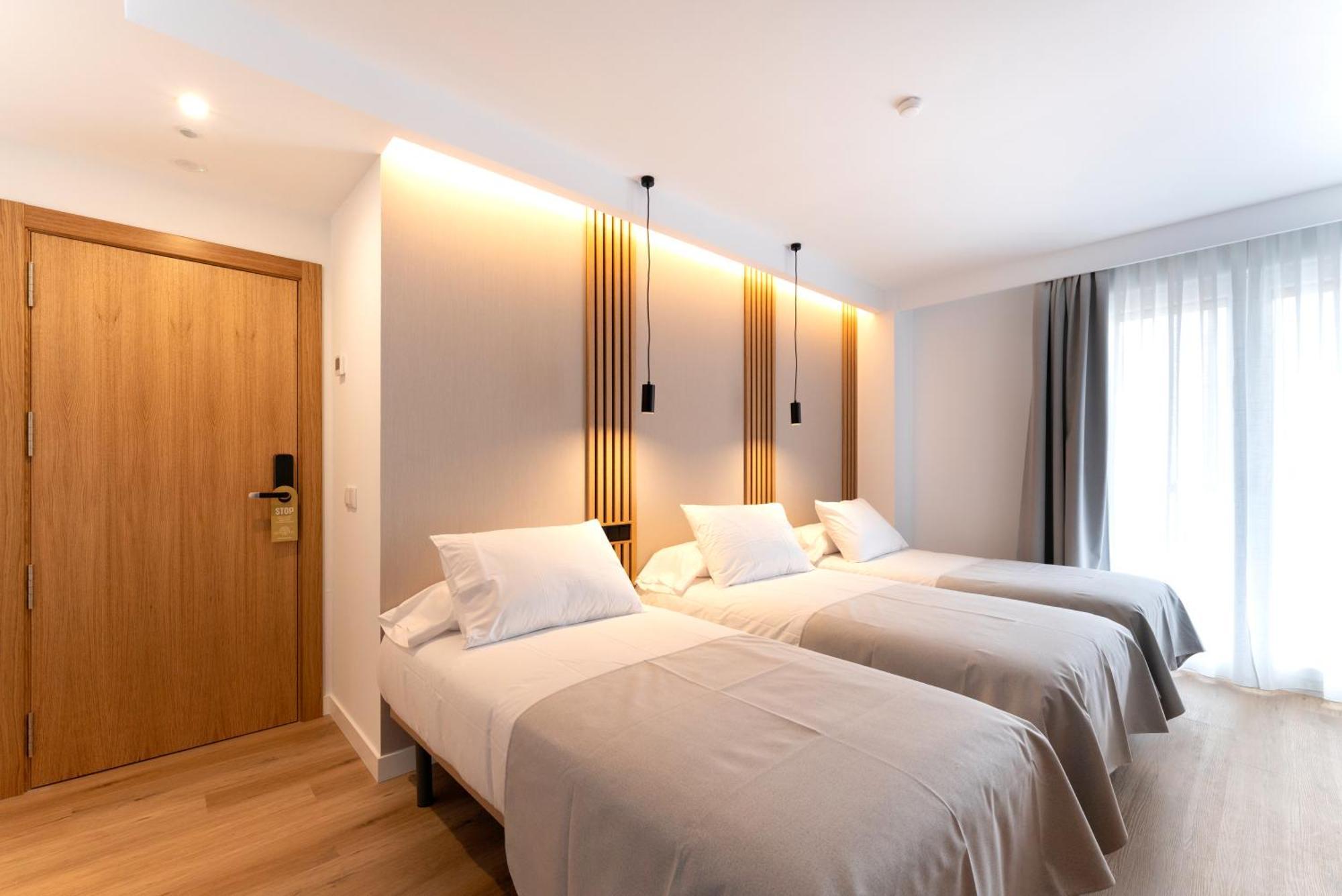 Habitación Triple con balcón